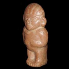 Hominoid terracotta figure